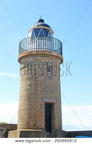 Portpatrick Lighthouse At The Harbour Entrance, Scotland