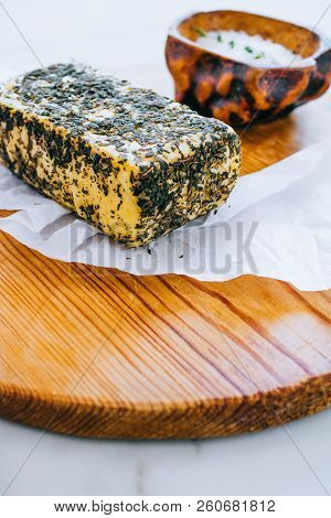 Cheese Halumi With Mint On A Wooden Board With And Salt