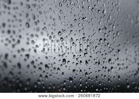 Raindrops Grey Background. Rainy Autumn Weather Concepr.