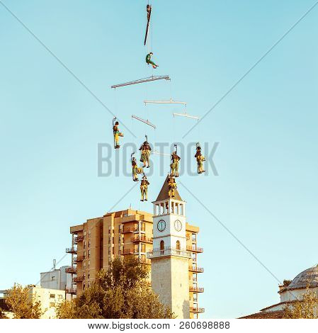 Tirana, Albania - September 2018: Aerial Gymnasts During Drums Performance Mobile Homme Over The Cit