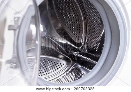 Washing Machine Drum Close Up, Laundry Concept.