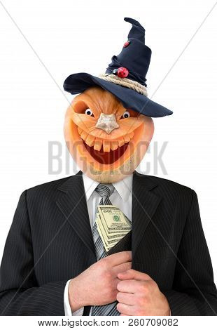Portrait Of Jack Lantern  From Pumpkin In Black Business Suit. Jack Lantern Keeps Money In His Hands