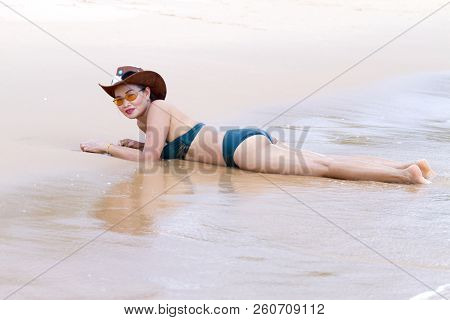 Woman Body Sexy With Bikini And Hat Relax On Beach At Bang Beot Beach, Chumphon Province Thailand