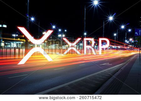 Concept Of Xrp Coin Moving Fast  On The Road, A Cryptocurrency Blockchain Platform , Digital Money