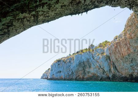 Apulia, Grotta Zinzulusa, Italy - Flying Birds At The Gigantic Cave Arch Of Grotto Zinzulusa
