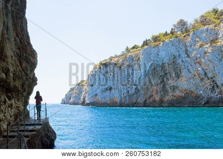Apulia, Grotta Zinzulusa, Italy - A Young Woman At The Famous Grotto Of Zinzulusa