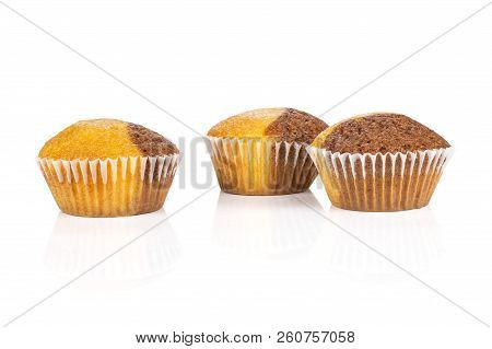 Group Of Three Whole Fresh Baked Marble Muffin Isolated On White Background