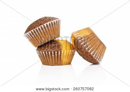 Group Of Three Whole Fresh Baked Marble Muffin Isolated On White Background