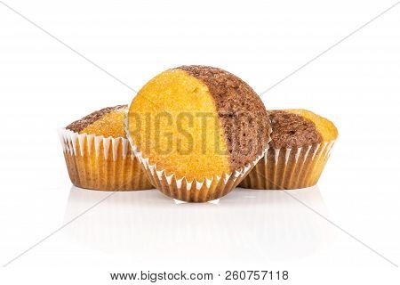 Group Of Three Whole Fresh Baked Marble Muffin Isolated On White Background