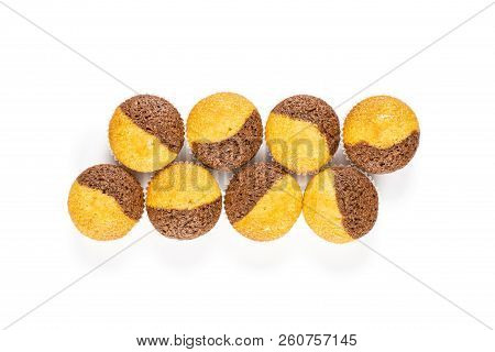 Group Of Eight Whole Fresh Baked Marble Muffin Flatlay Isolated On White Background