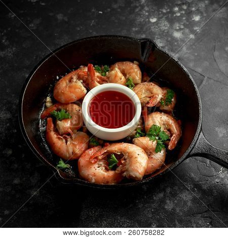 Fried In Garlic Butter Shrimps Served With Sweet Chili Suace And Parsley