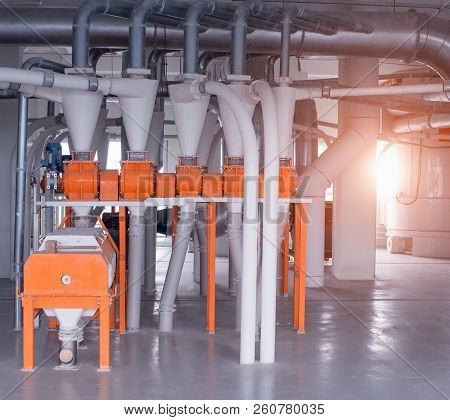 Plant For The Production Of Food Flour, A Lot Of Metal Pipes Through Which Food Flour Passes, Breads