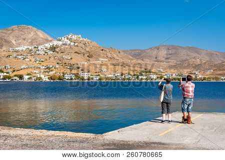 Serifos, Greece - September 8, 2018: Tourists Taking A Picture Of Beautiful Hills Of Serifos Island.