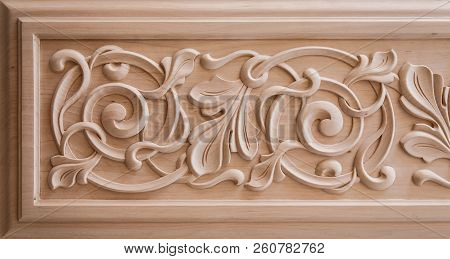 Wood Processing. Joinery Work. Wood Carving. Decorative, Abstract, Floral Ornament. Pattern Of Flowe