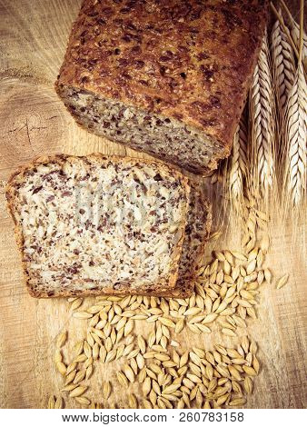 Multi-grain Bread On A Wooden Background. Healthy Food Concept.