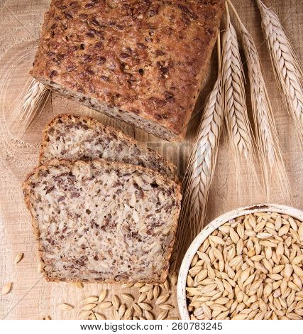 Multi-grain Bread On A Wooden Background. Healthy Food Concept.