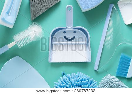 House Cleaning Product On Green Table Background, Smile Product For Cleaning House Concept