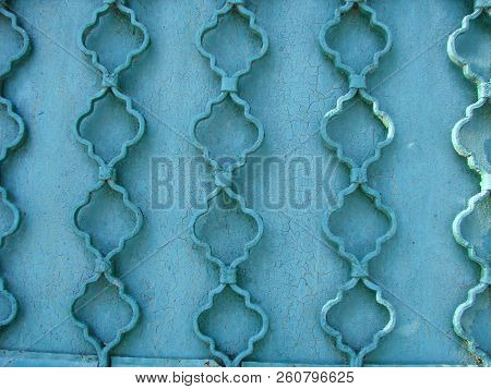 Iron Gate With Wrought Ornament On It