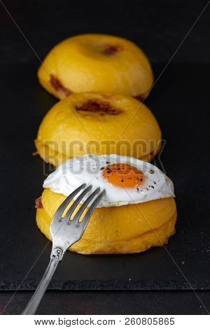 Bulz, A Traditional Romanian Meal Composed Of Polenta Balls Stuffed With Sheep Cheese And Roasted Sm
