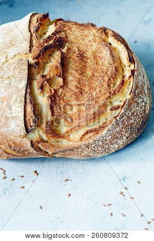 Fresh Homemade Bread From Whole Wheat And Rye Flour With Flax Seeds, Pumpkin And Oat Flakes On A Bro