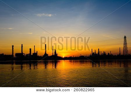 Oil Refineries And Evening Light .sun Set