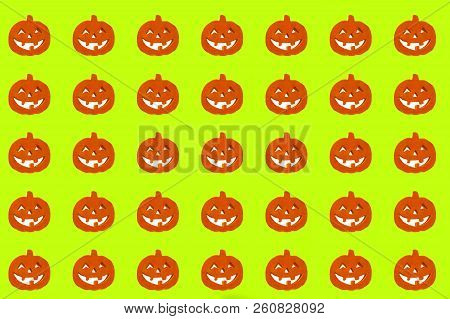 Orange Halloween Pumpkins On The Greenbackground Isolated. Paper For Wrapping