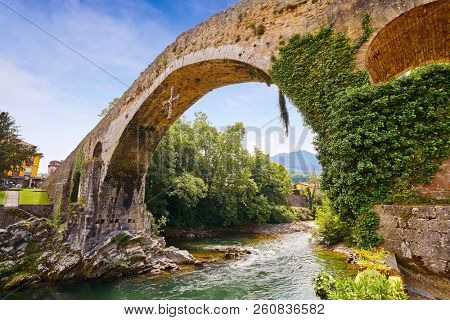 Cangas de Onis roman bridge on Sella river in Asturias of Spain