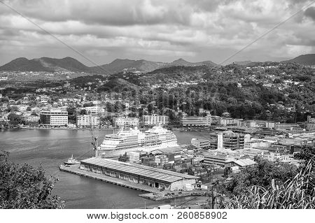 Castries, St.lucia - November 26, 2015: Ocean Liner In Sea Port On Mountain Landscape. Town On Blue 