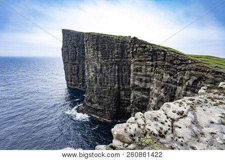 Amazing View Of Slave Mountains Of Tralanipan Steep Cliff In Vagar Island, Faroe Islands, Denmark No