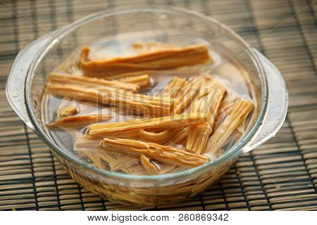 Rehydration of dried yuba sticks, the soybean product also known as fuju, fuzhu, or tofu skin