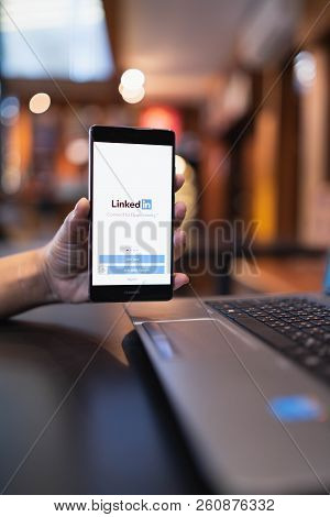 Chiang Mai, Thailand - May 05,2018: Man Holding Huawei Mobile Phone With Linkedin Application On The
