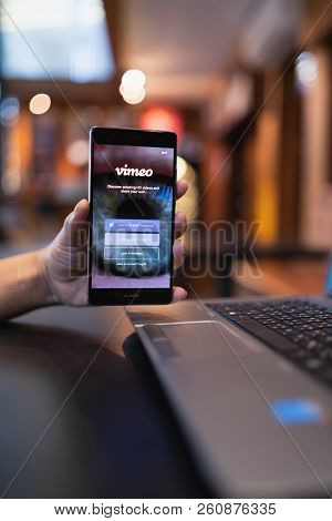 Chiang Mai, Thailand - May 05,2018: Man Holding Huawei With Vimeo On Screen.  Vimeo Is A Video-shari