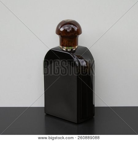 Eau De Toilette, Large Perfume Bottle In Front Of A White Background