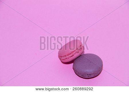 Macaroni On A Gently Pink Background. Delicious Cakes For Tea. Dessert Close-up.