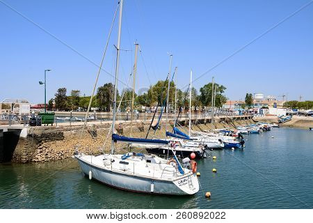Olhau, Portugal - June 12, 2017 - View Of Yachts Moored In The Marina Against The Avenida 5 De Outub