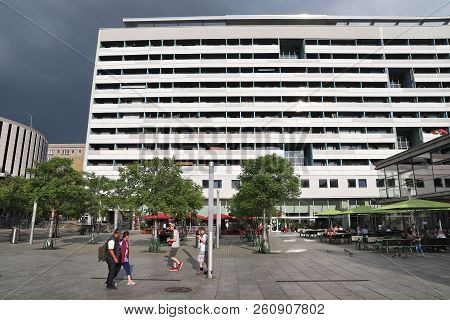 Dresden, Germany - May 10, 2018: People Walk By Prager Zeile Condominium Building In Dresden, German