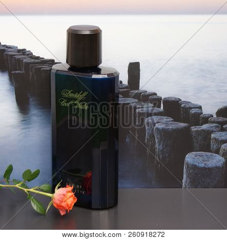 Davidoff Cool Water, Eau De Toilette, Large Perfume Bottle In Front Of The Picture Of A Groyne In Th