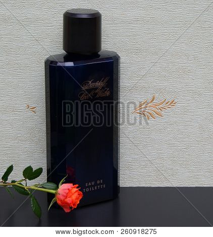 Davidoff Cool Water, Eau De Toilette, Large Perfume Bottle In Front Of The Satin Wallcovering Elysee