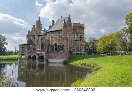 Bazel, Belgium - September 30, 2018, Castle Wissekerke, With Beautiful Sky And Beautiful Green Grass