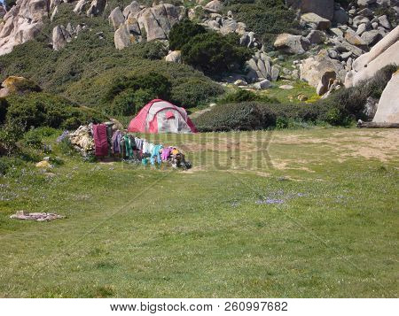 Nylon Tent Erected For Camping Vacation In Isolated Meadow, Sardinia, Italy