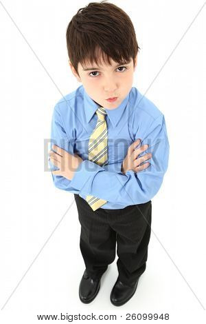 Adorable sieben Jahre alte französische american Boy in Hose, Hemd und Krawatte over white Background.