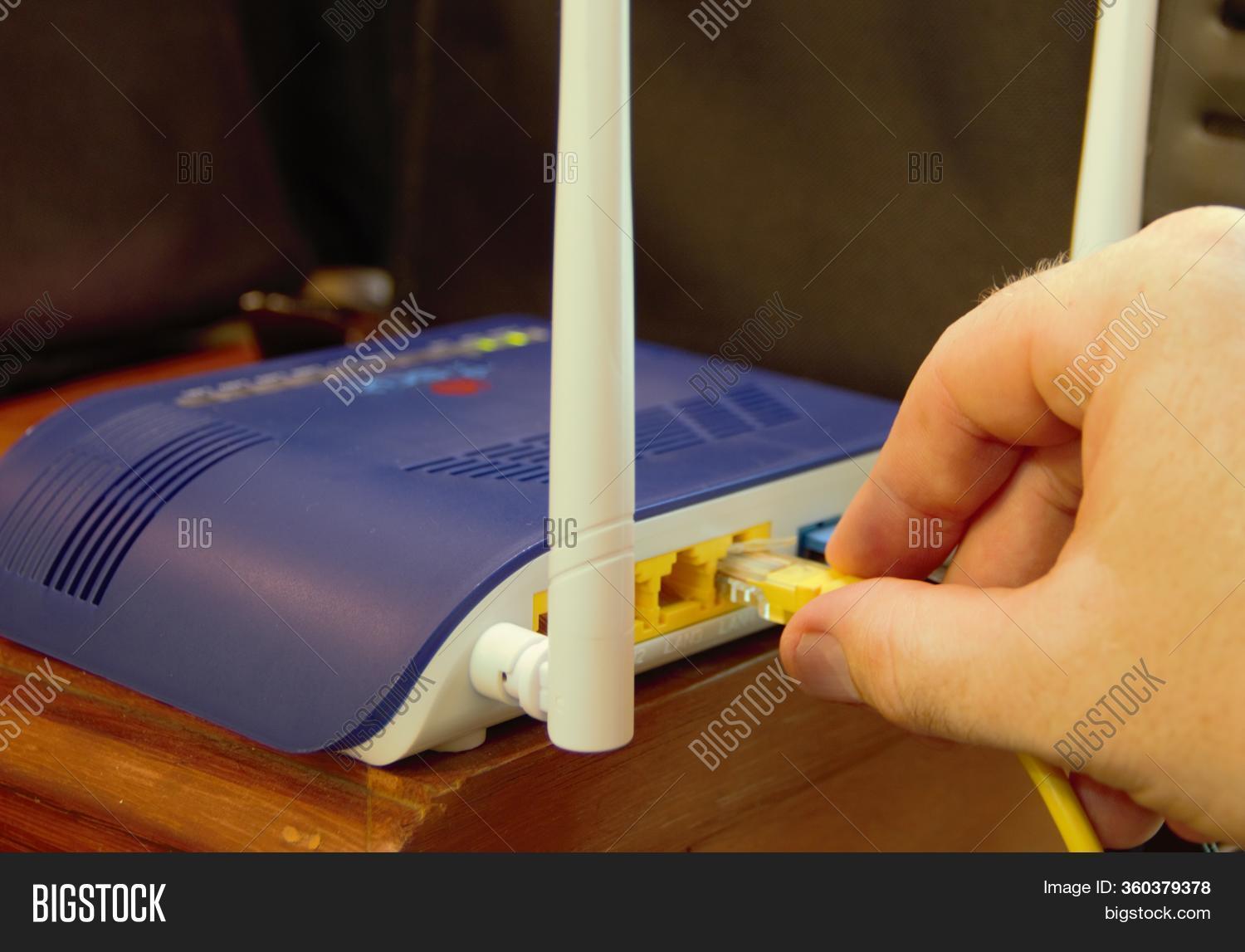 Connecting Router Image & Photo (Free Trial) Bigstock