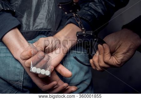 Police Officer And Man Arrested For Drug Possession.