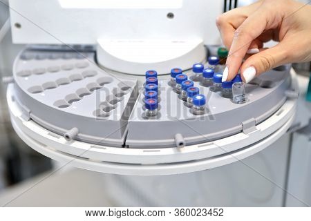 Quality Control Laboratory Medicine. Chromatograph Operation. A Woman Makes An Analysis On A Gas Chr