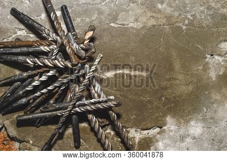 Drills On Concrete Of Different Diameter And Degree Of Novelty For A Perforator Lie On A Concrete Pl