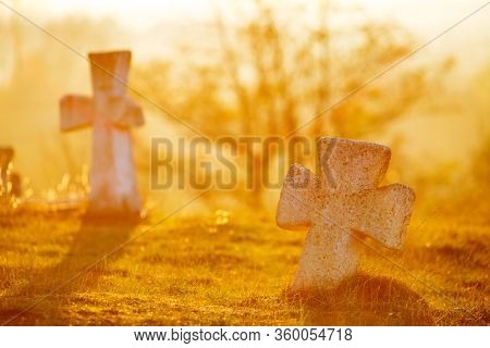 Ancient slavic stone Crosses in an old cemetery located near famous Podkamin Rock. Cossack graves 17th century. Location place Pidkamin, Lviv Oblast, Ukraine, Europe. Discover the beauty of earth.