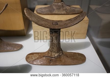Barcelona, Spain - Dec 27th, 2019: Wooden Headdrest. Middle Kingdom, 2040 Bc. Museum Of Ancient Egyp