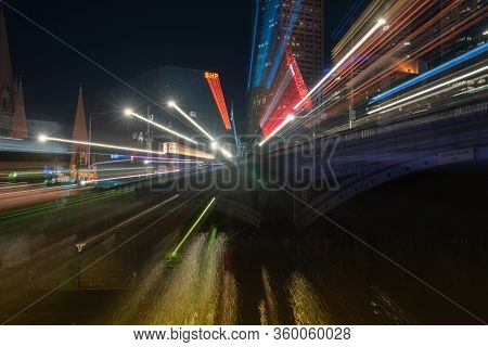 Melbourne Australia - March 9 2020; City At Night, Buildings, Lights And Reflections In Zoom Blur Ab