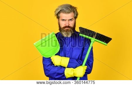Garbage Removal. Cleaning Day. Janitor Professional. Bearded Hipster Blue Uniform With Broom. Garden