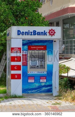 Alanya, Antalya, Tureky - Jun 09, 2019: Deniz Bank Atm At The Street Of Sunny Alanya Covered By The 